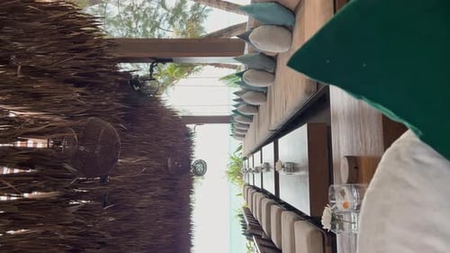Few Tables in Row in Restaurant on a Beach Club at Sunny Day Lounge Chairs Sofas