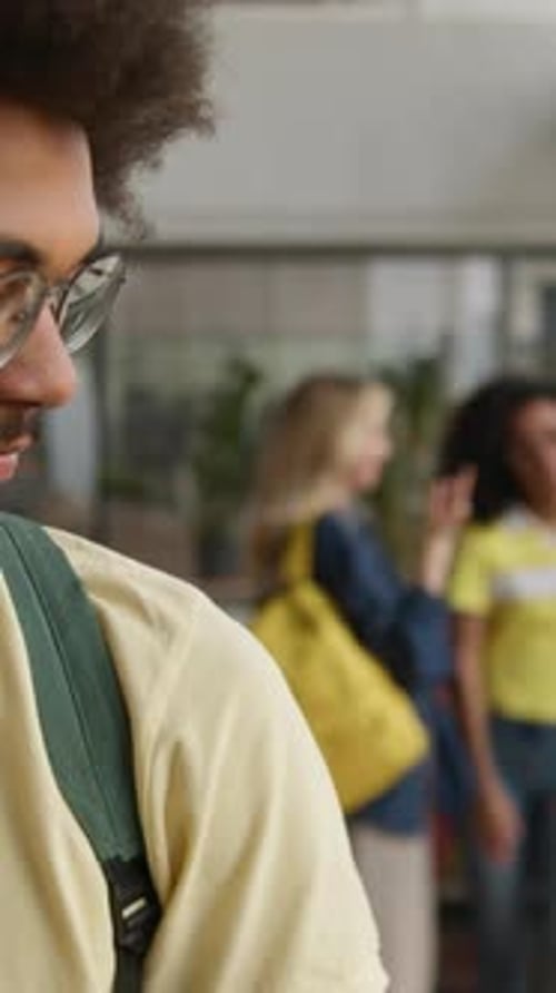 Portrait Disappointed African American Man Guy Student Upset with Bullying By Four Multiethnic