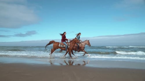 Super Shof of Women Riding Horses at Beach, Oregon,