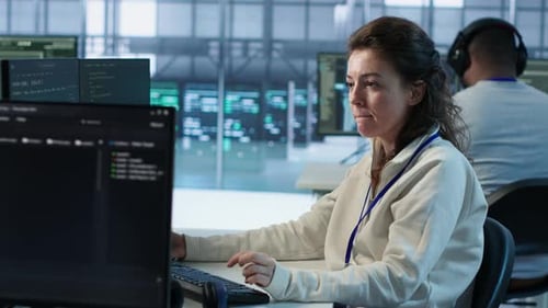 IT Technicians in Server Farm Brainstorming Ways to Repair Equipment