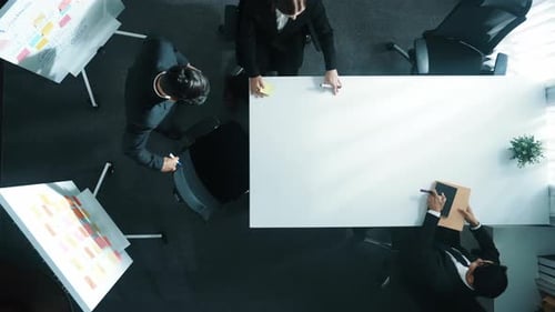 Top view of businesswoman give sticky notes to meeting participant. Directorate.