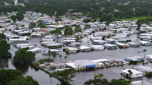 Flooded Houses From Hurricane Rainfall Water in Residential Community in Florida Aftermath of