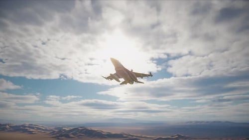 F-16 Falcon fighter jet flying over a desert landscape armed with bombs