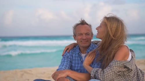 Romantic Middleaged Couple Enjoying a Peaceful Evening Together on the Beach Love Connection and