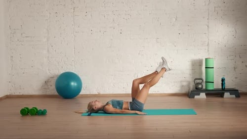 Healthcare and Wellness Advertisement Concept Athletic Woman Fitness Coach Doing Legs Up Cross Lift