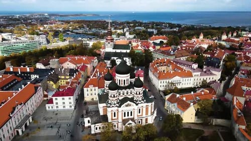 Tallinn, Estonia. Aerial Hyperlapse, Orbiting View of Old Town Landmarks and Cityscape on Sunny Day