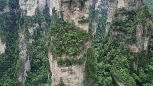 4K Aerial Reverse Shot Of Zhangjiajie National Park; Heavenly Pillar "Hallelujah Mountain" Featured