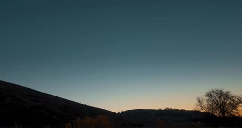 Mountain Meadow Timelapse at the Summer or Autumn Sunrise Time