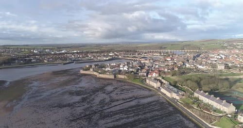 High aerial push in towards town of Berwick Upon tweed