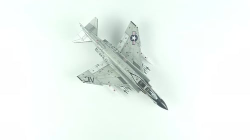 Scale Model Fighter Jet Rotating Overhead on White