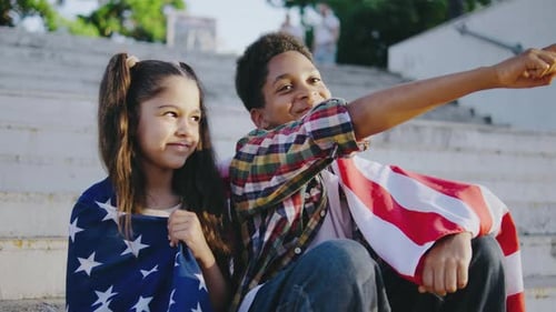 Smiling Children With American Flag on Steps
