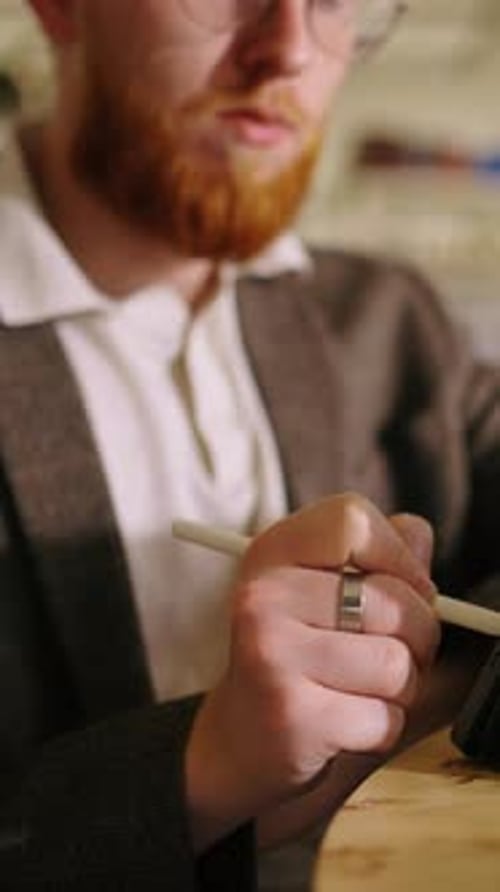 People Working Together with Digital Tablets and Papers