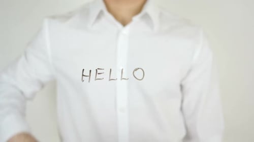 Writing Hello on Clear Surface