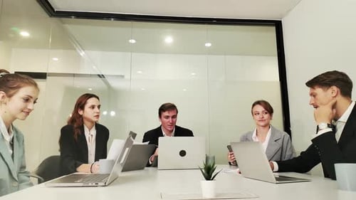 Meeting, documents and business people in office for report for planning, finance review or analysis