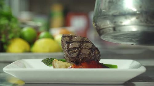 Chef Plates Juicy Steak with Mushroom Sauce