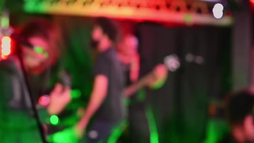 Defocused view of metal band on stage
