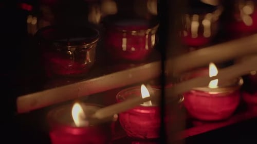 Candles Lit in the Darkness