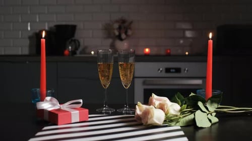 Romantic Champagne Toast with Roses and Gift