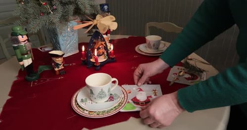 Festive Christmas Table Setting with Decorative Ornaments