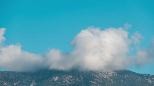 Time Lapse of Clouds Against Blue Sky