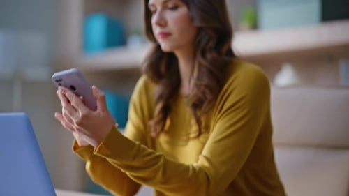 Working Employee Taking Mobile Phone Frustrated Message at Workplace Closeup