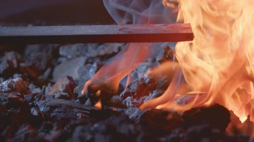 Blazing Fire Engulfing Coal and Metal