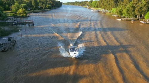 Boat In Brown Water River Aerial View