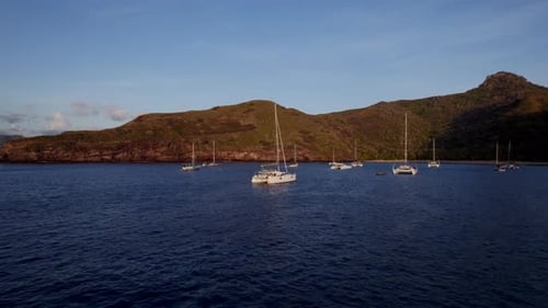 Aerial View Of Sailboats Floating On Calm Blue Sea