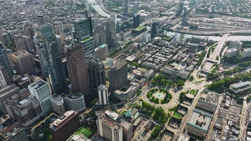 An aerial view of a city with lots of tall buildings