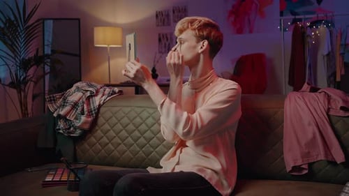 Young Adult Applying Makeup in Home Setting