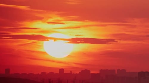 The heaven-like landscape was created by the red and orange clouds illuminated by the sunlight durin