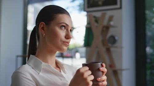 Calm Employee Sipping Coffee Enjoying Work Break in Corporate Office Closeup