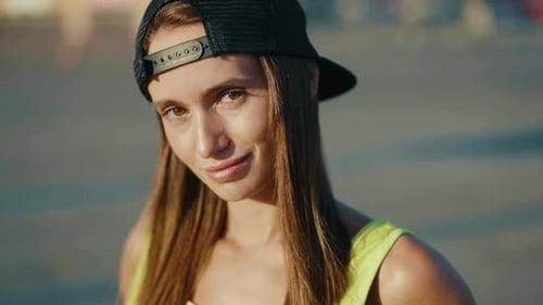 Close Up Stylish Woman with Cap Look at Camera Smiling Standing on Urban Street City Casual