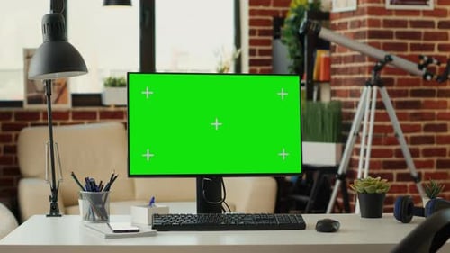 Modern Computer Workstation with Green Screen Display