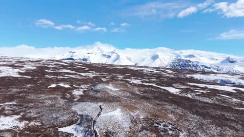 Skyline, iced mountain background, drone fly above Volcanic Icelandic landscape