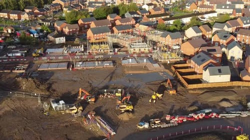 New property development aerial view over housing foundation construction site planning