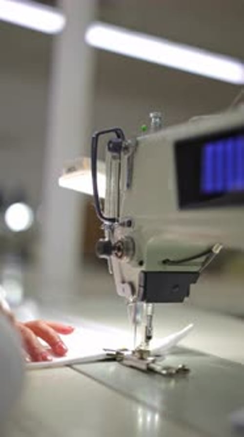 Industrial Sewing Machine Operation Stitching White Fabric