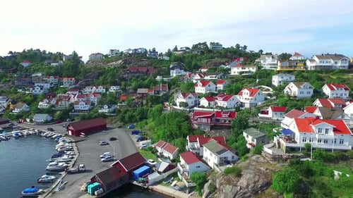 4K aerial drone footage of a remote and quiet harbour town in Kragero