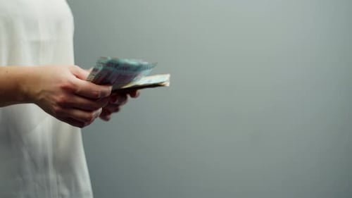 Counting Cash and Giving Money to Another Hand