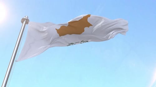 Realistic Waving Flag of Cyprus Against Bright Blue Sky