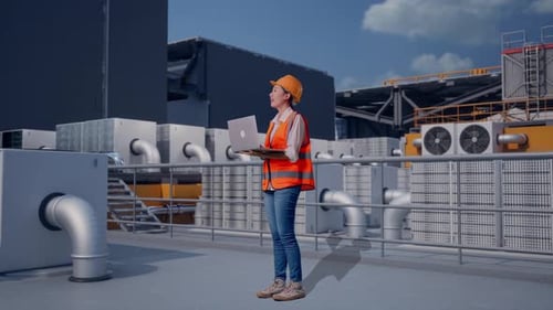 Full Body Side View Of Asian Female Engineer Working On A Laptop On Rooftop HVAC