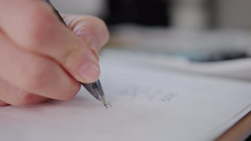 Woman Checking Bills Taxes Bank Account Balance and Calculating Expenses in the Living Room at Home