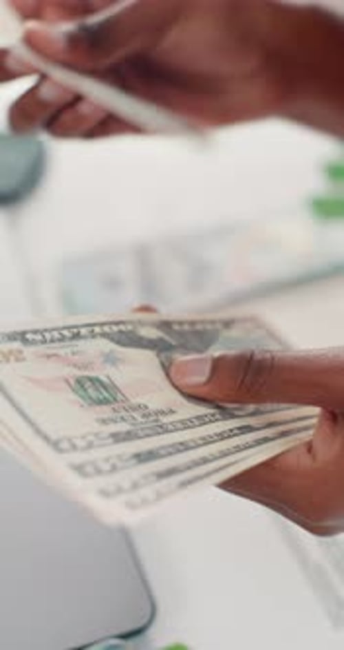 Woman, hands and counting money with dollar bills for finance, cash or budget in office