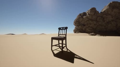 A Chair Sitting in the Middle of a Desert