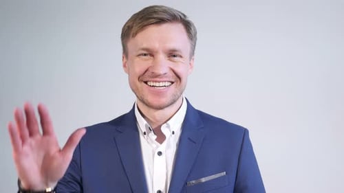 Waving Businessman Saying Hello