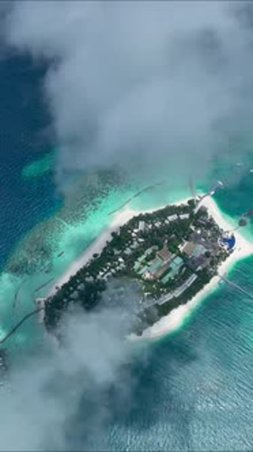 Aerial view of an island with white sand, Maldives.
