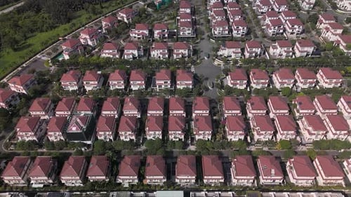 Modern housing estate top down aerial view in beautiful sunnny light.