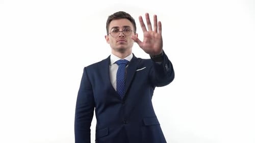 Man in Suit Interacting with Digital Interface