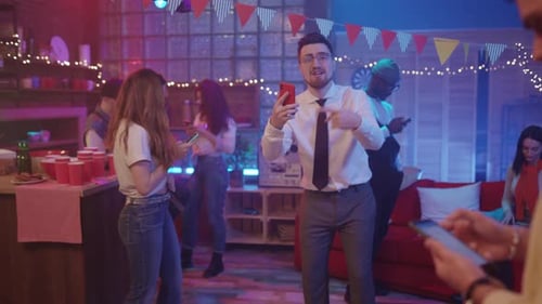 Young Adults Celebrate at an Indoor Party