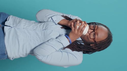 Smiling Woman Holding Coffee Cup